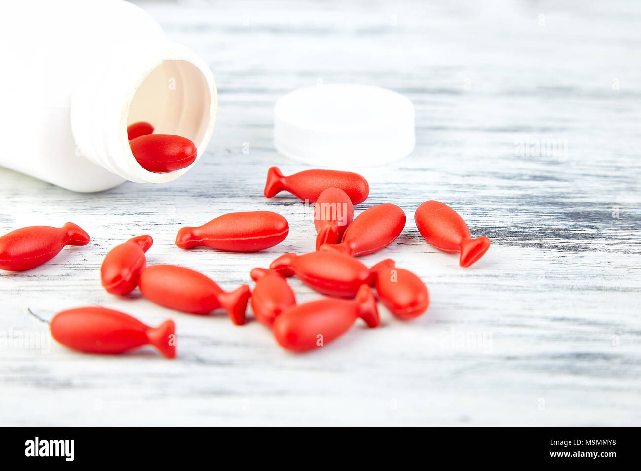 Download Omega 3 In Fish Shaped Red Capsules Of Fish Oil In Bottle On White Background Copy Space Stock Photo Alamy Yellowimages Mockups