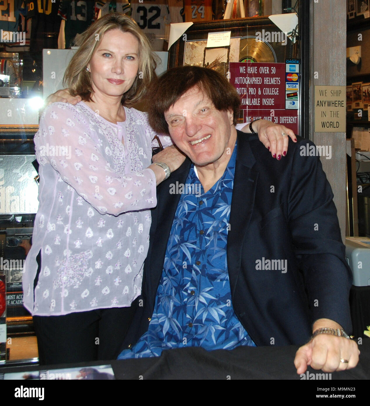 LAS VEGAS - NOVEMBER 30: Richard ' Jawz'  Kiel (The Spy Who Loved Me, Moonraker) and Maud Adams (The Man with The Golden Gun, Octopussy)  at the Gallery of Legends memorabilia store in the mall adjoining the Planet Hollywood Hotel & Casino.  on November 29, 2008 in Las Vegas, Nevada.    People:  Richard Kiel, Maud Adams Stock Photo