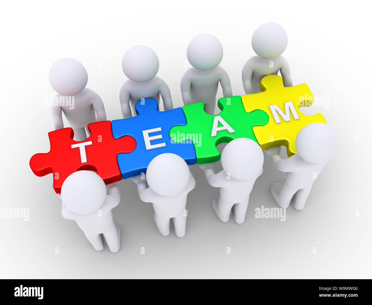 3d people holding puzzle pieces with TEAM letters on them Stock Photo -  Alamy