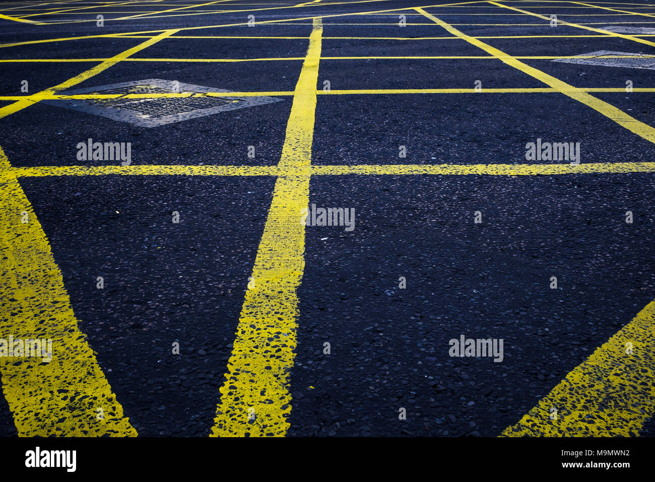 Road markings at traffic light intersection, abstract, London, England, Great Britain Stock Photo