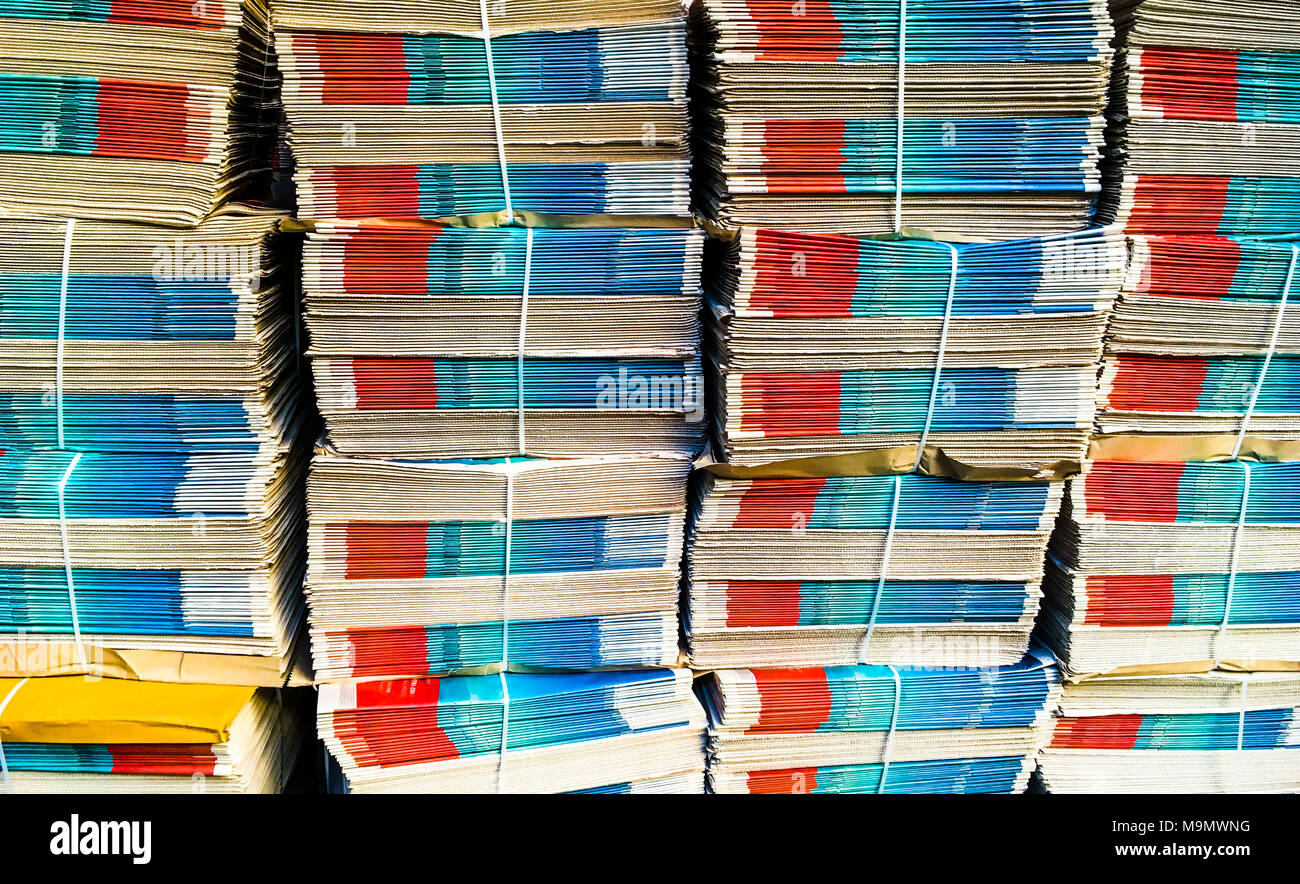 Several stacks with bundles of newspapers, London, England, Great Britain Stock Photo
