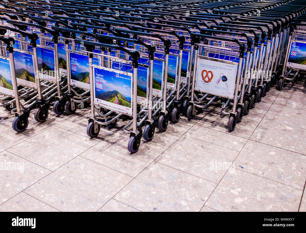 Airport baggage carts hires stock photography and images Alamy