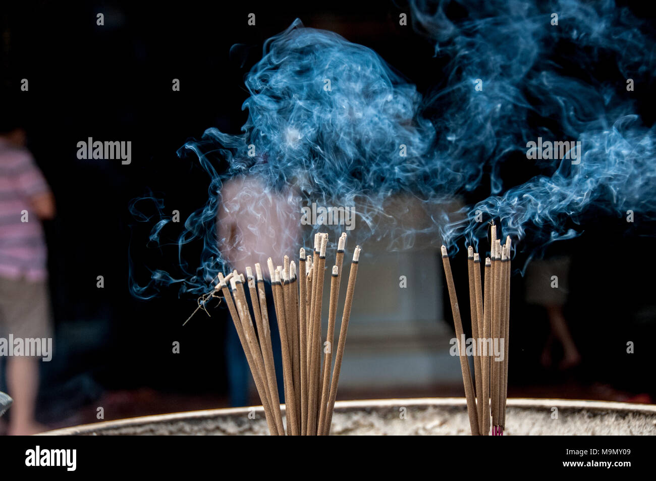 Incense sticks in vietnamese temple hi-res stock photography and images ...