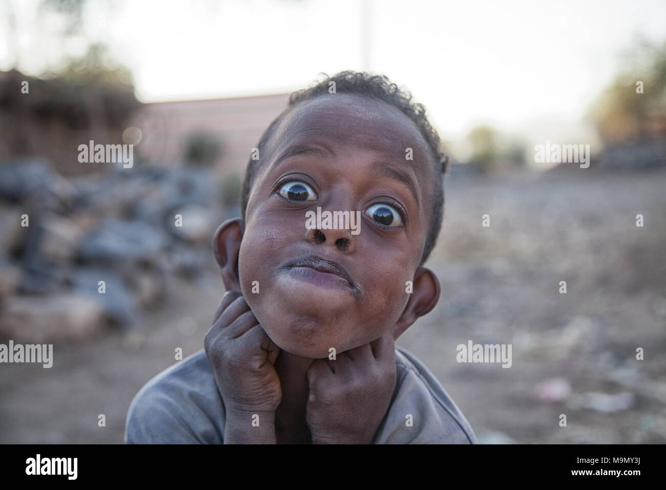 Child pulls grimace, portrait, at Mekele, Region Tigray, Ethiopia Stock Photo