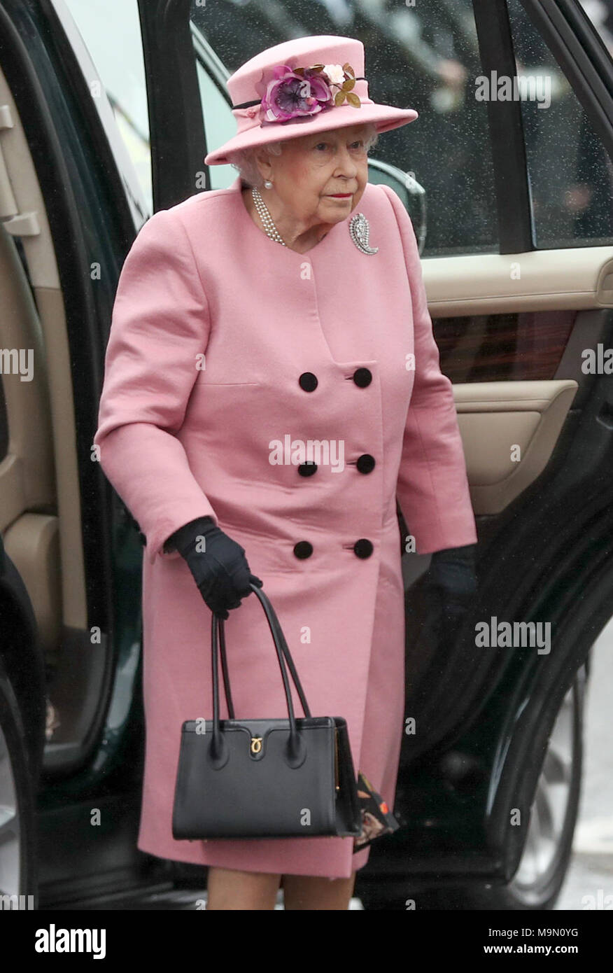 Queen Elizabeth II arrives for the decommissioning ceremony for HMS Ocean at HMNB Devonport in Plymouth. Stock Photo