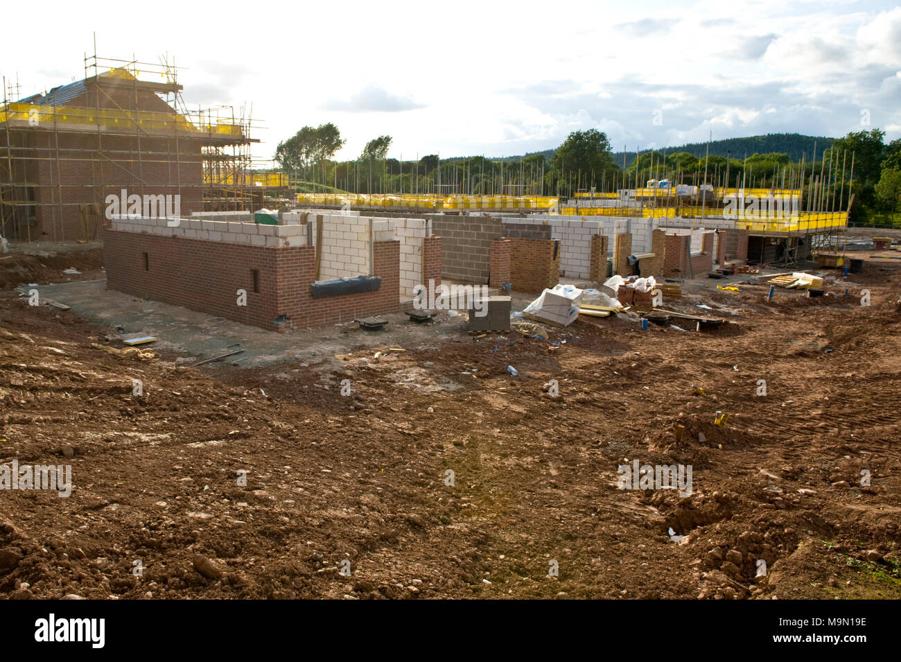 Persimmon homes Readers Retreat site houses under construction on a greenfield site at Hay on Wye Powys Wales UK Stock Photo