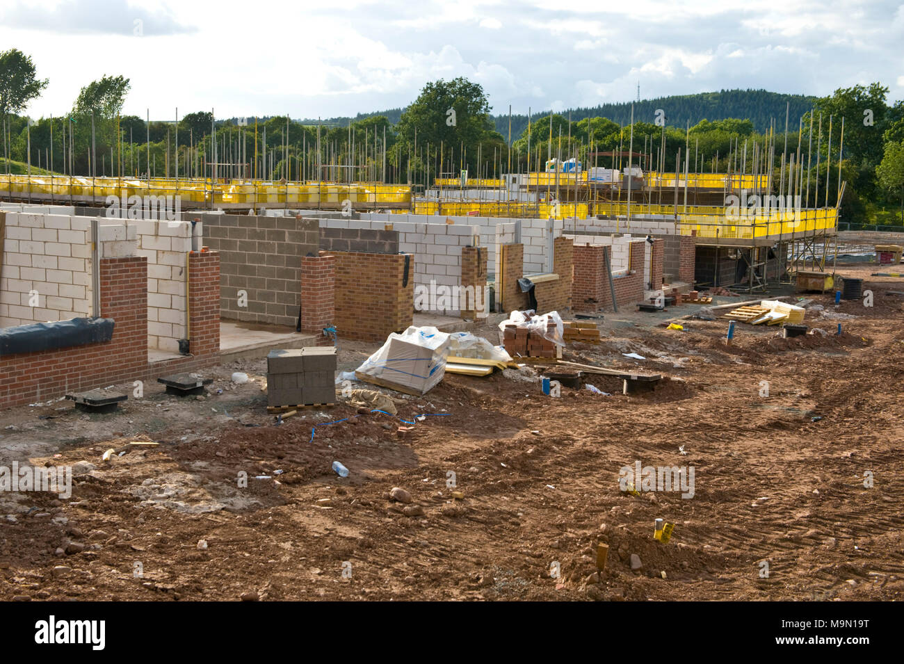 Persimmon homes Readers Retreat site houses under construction on a greenfield site at Hay on Wye Powys Wales UK Stock Photo
