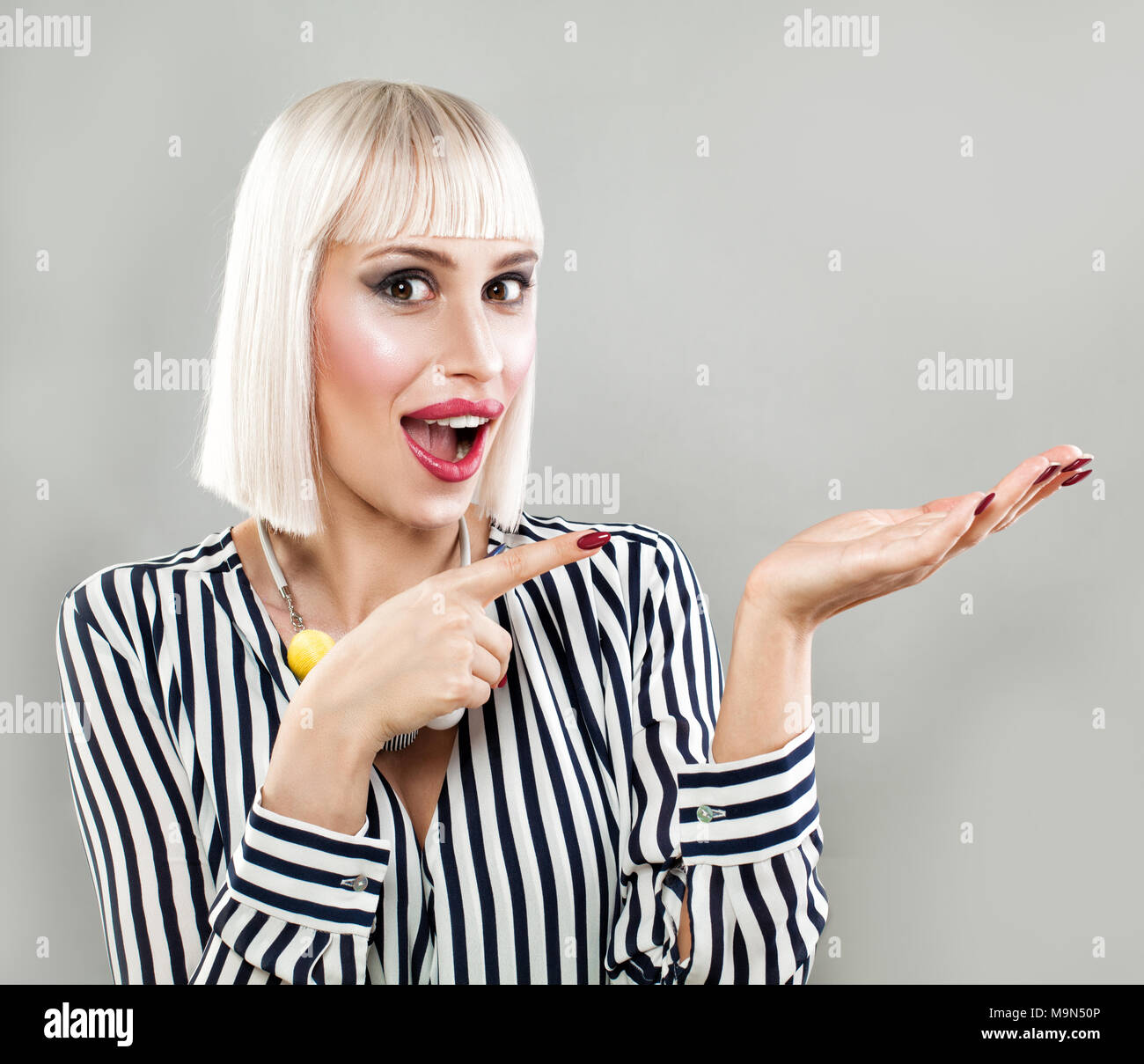 Surprised blonde girl hi-res stock photography and images - Alamy