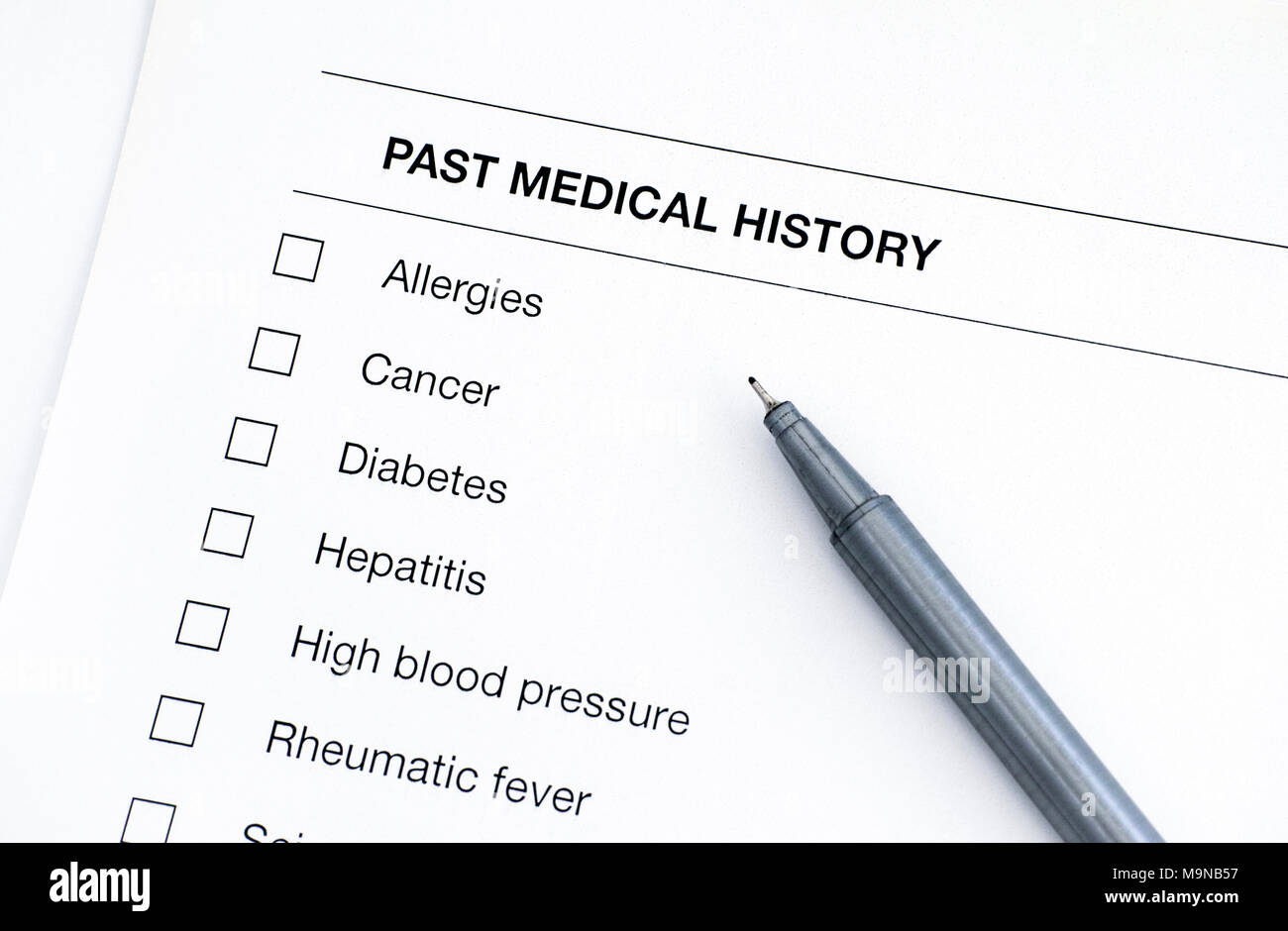 Past medical history questionary with pen. Closeup Stock Photo Alamy