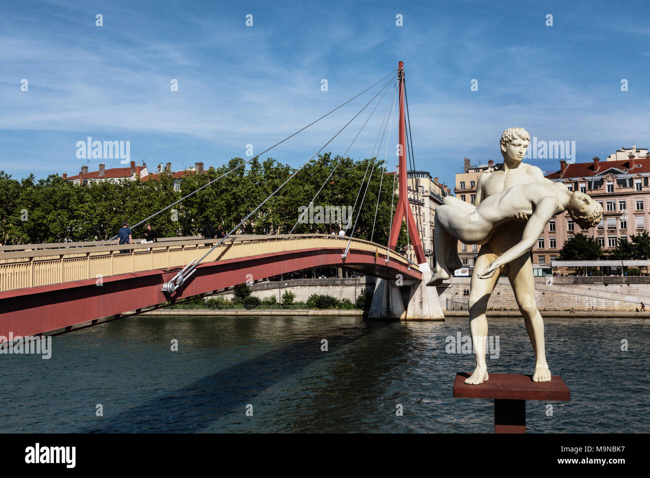 The Weight of Oneself statue on the Saone Banks near the Palais de Justice footbridge, Lyon, Rhone, France. Stock Photo