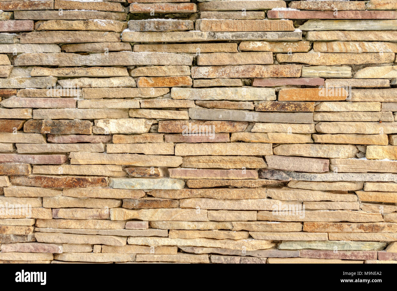 Sandstone brick stone wall texture background Stock Photo - Alamy