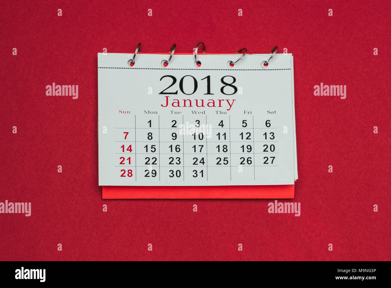 close up view of 2018 calendar isolated on red Stock Photo