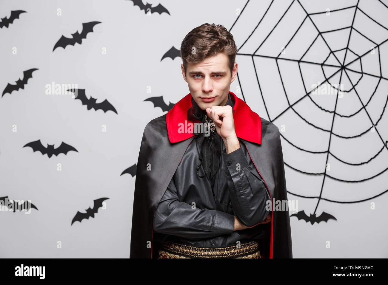 Vampire Halloween Concept Portrait of handsome caucasian Vampire in