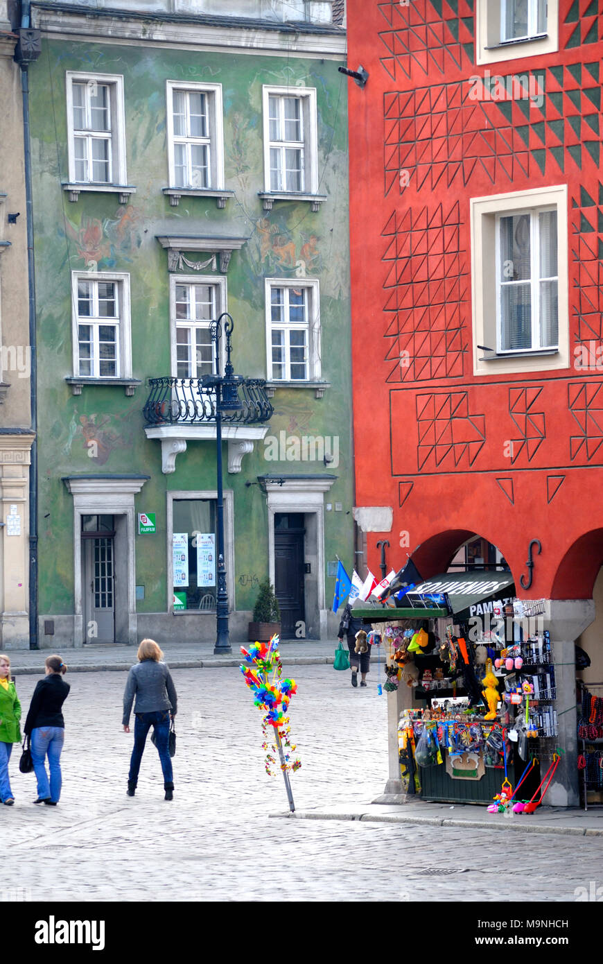 Poznan, Wielkopolska, Poland. Market Square or Rynek. Market traders' Houses. Souvenir stalls in the arches Stock Photo