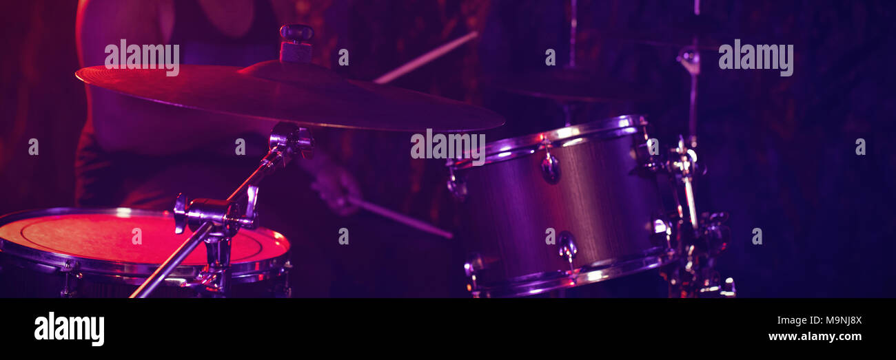 Drummer playing drum Stock Photo