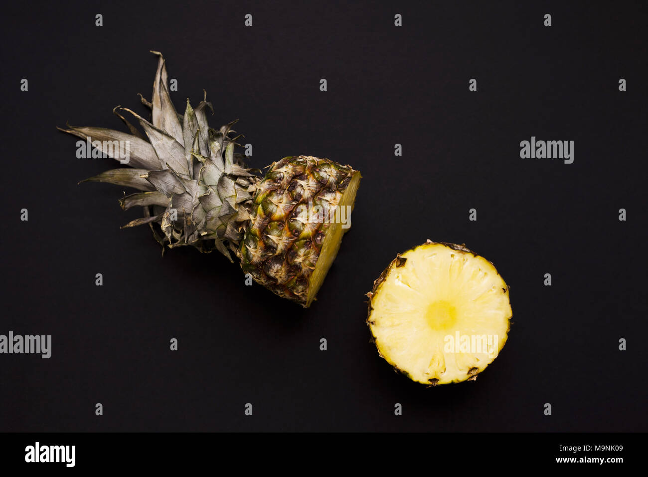 Pineapple. Shot sliced in half to show inner fruit Stock Photo