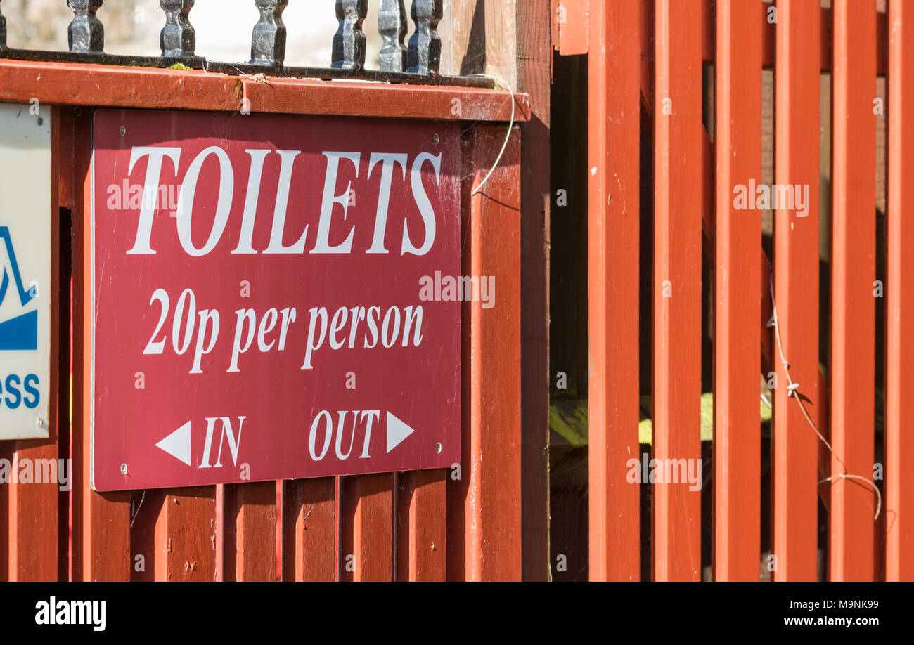 Toilets sign showing the cost of paying to use a public toilet in the