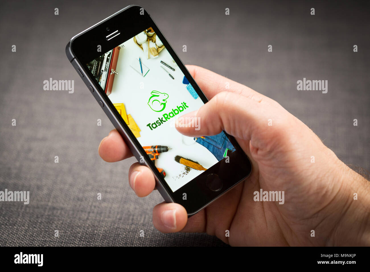 Task Rabbit app on an iPhone Stock Photo