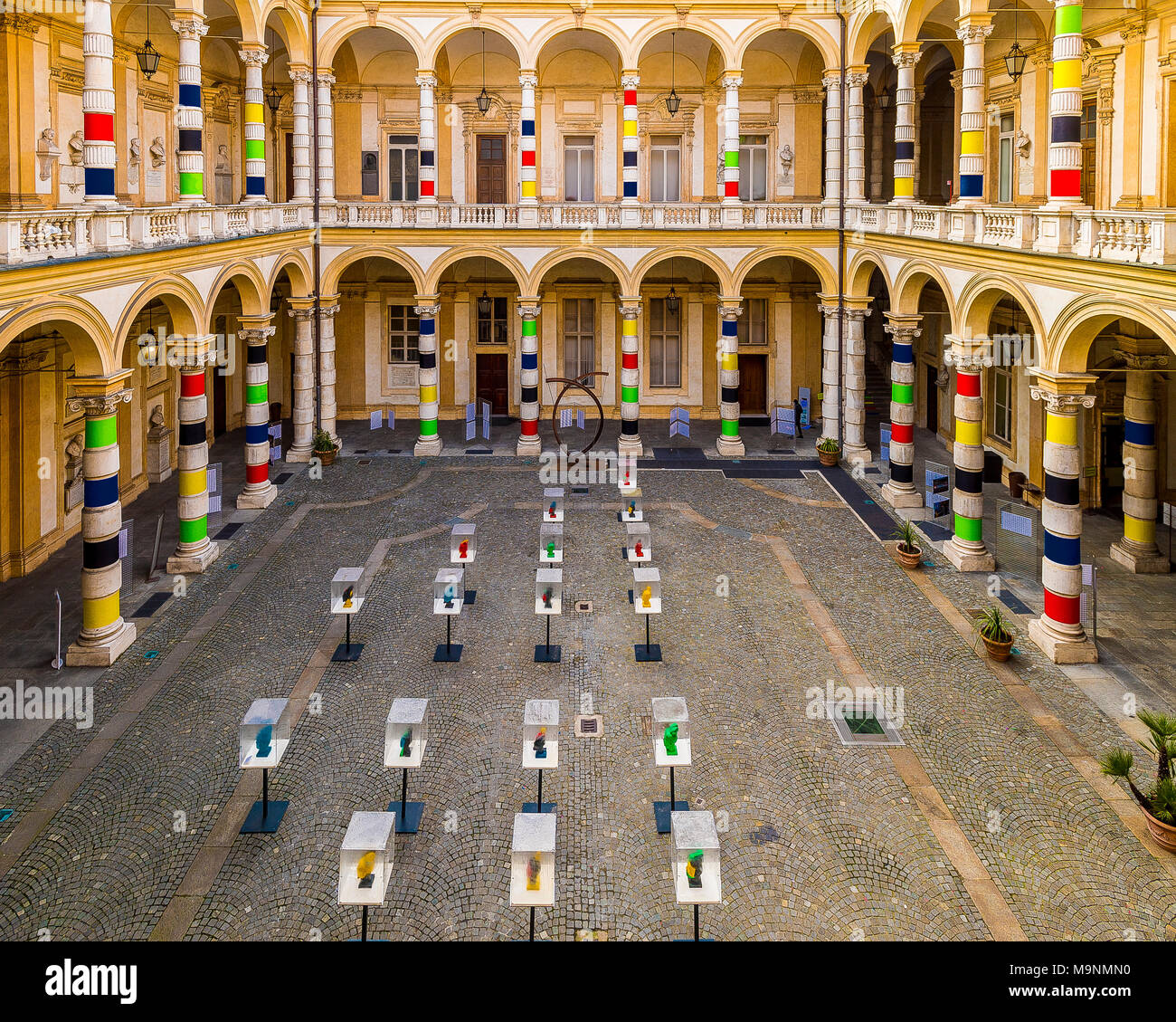 Italy Piedmont Turin Old City - Via Po -Palazzo dell'Università during the exhibition of the Project by Zhang Hongmei entitled Urban Colors + Xi'an warriors Stock Photo