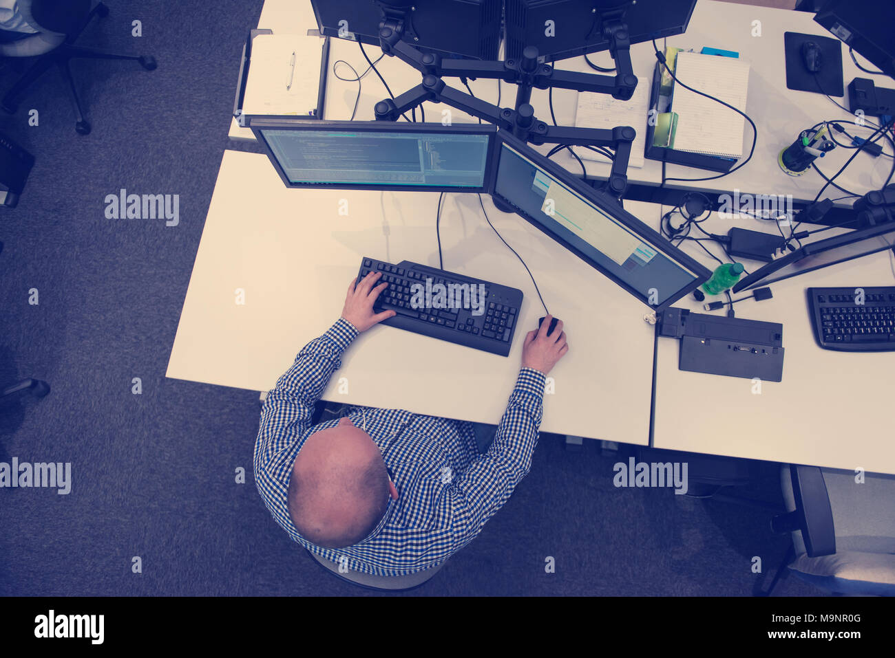 top view of software developer writing programming code on computer ...