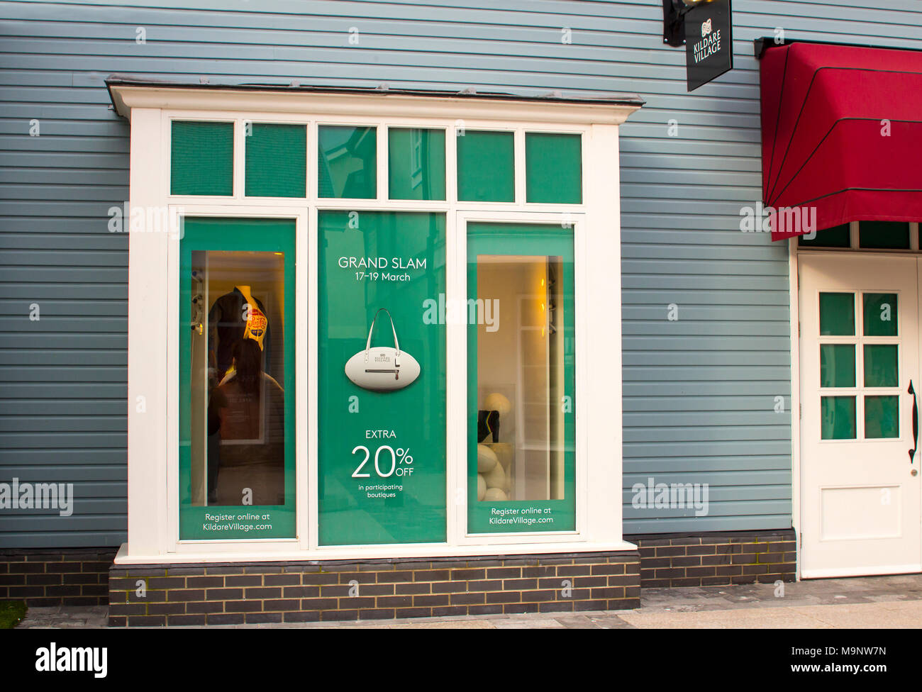 Kildare Village retail shopping outlet. A shop window dressed in  anticipation of Ireland's Grand Slam victory over England at Twickenham in  the Six N Stock Photo - Alamy