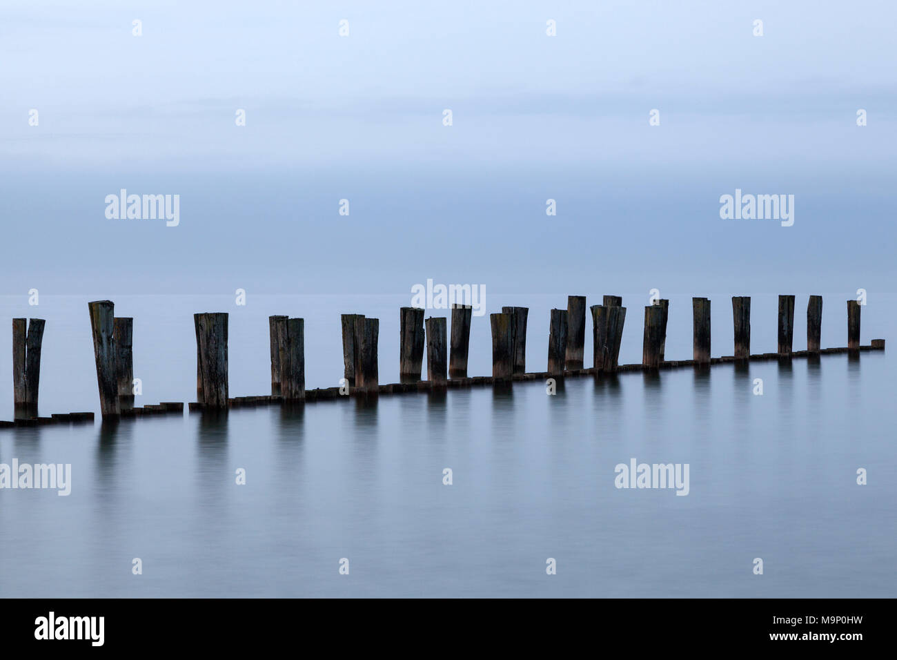Groynes, wooden stages, long time exposure, Zingst, Fischland-Darß-Zingst, Western Pomerania Lagoon Area National Park Stock Photo