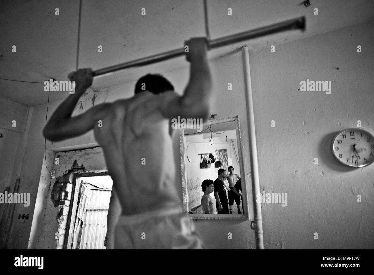 Afghan wrestlers train at a gym in Kabul, Afghanistan, Saturday, September 13, 2009. Many forms of exercise were banned under the Taliban rule. Stock Photo