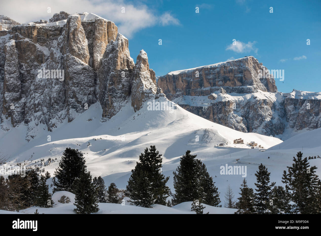 Sella Pass in winter, Sella massif with Sella towers, Dolomites, Selva di Val Gardena, Dolomites, South Tyrol, Alto Adige Stock Photo