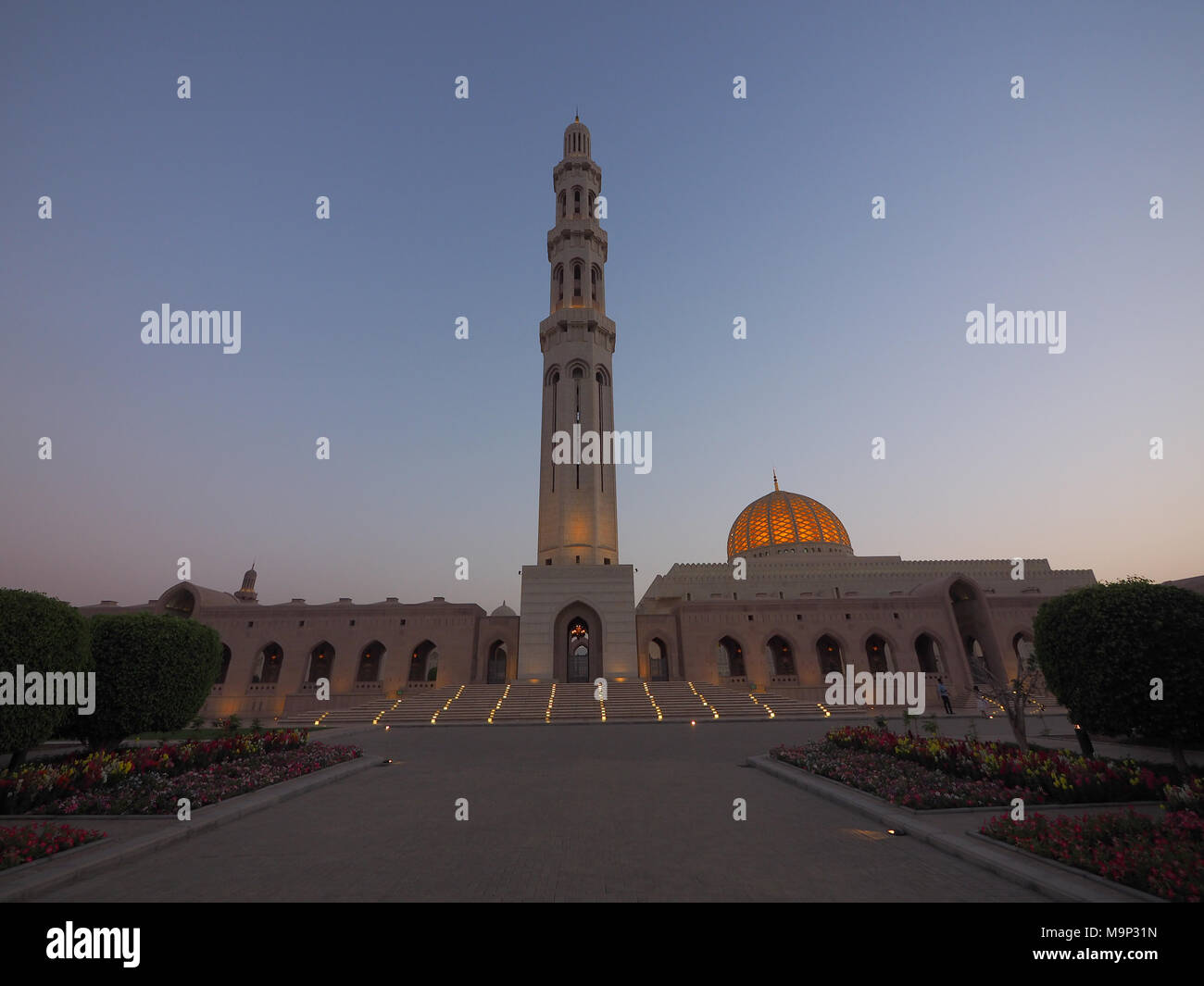 Evening atmosphere, Great Sultan Qabus Mosque with minaret, Muscat, Oman Stock Photo