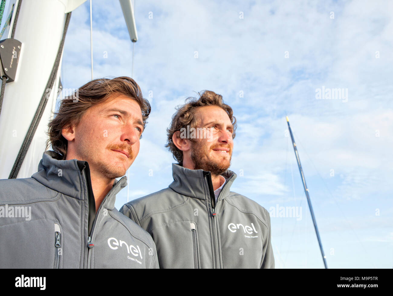 Portrait of two men standing on boat, Lorient, Brittany, France Stock Photo