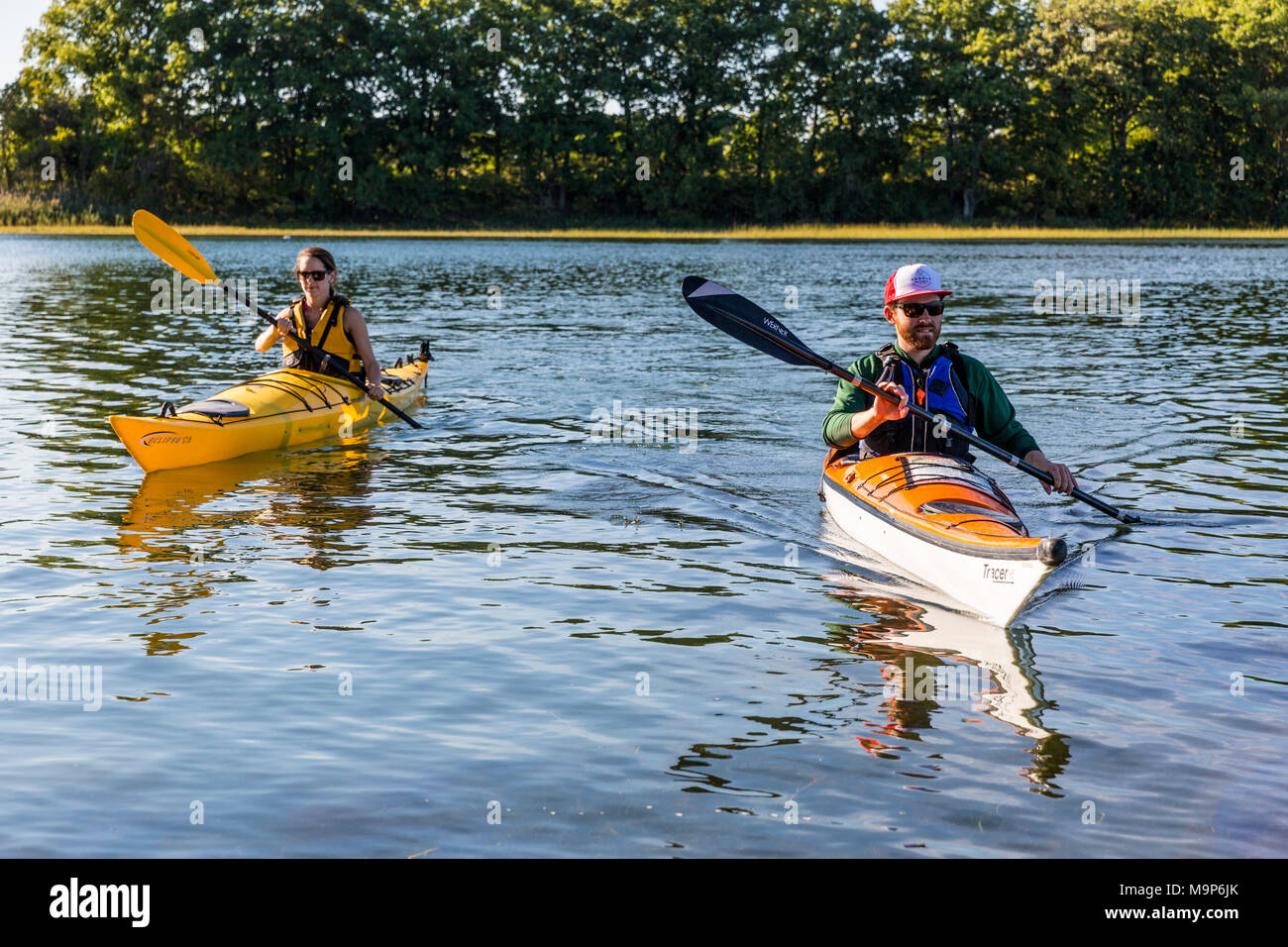 Kayakers on Essex River at Cox Reservation in Essex, Massachusetts Stock Photo