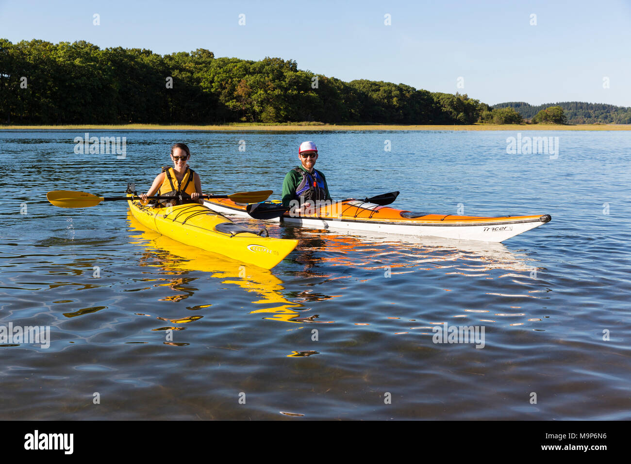 Kayakers on Essex River at Cox Reservation in Essex, Massachusetts Stock Photo