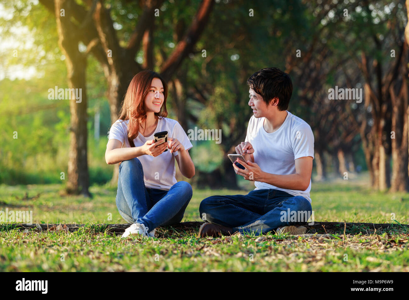 Man in green park talking hi-res stock photography and images - Alamy
