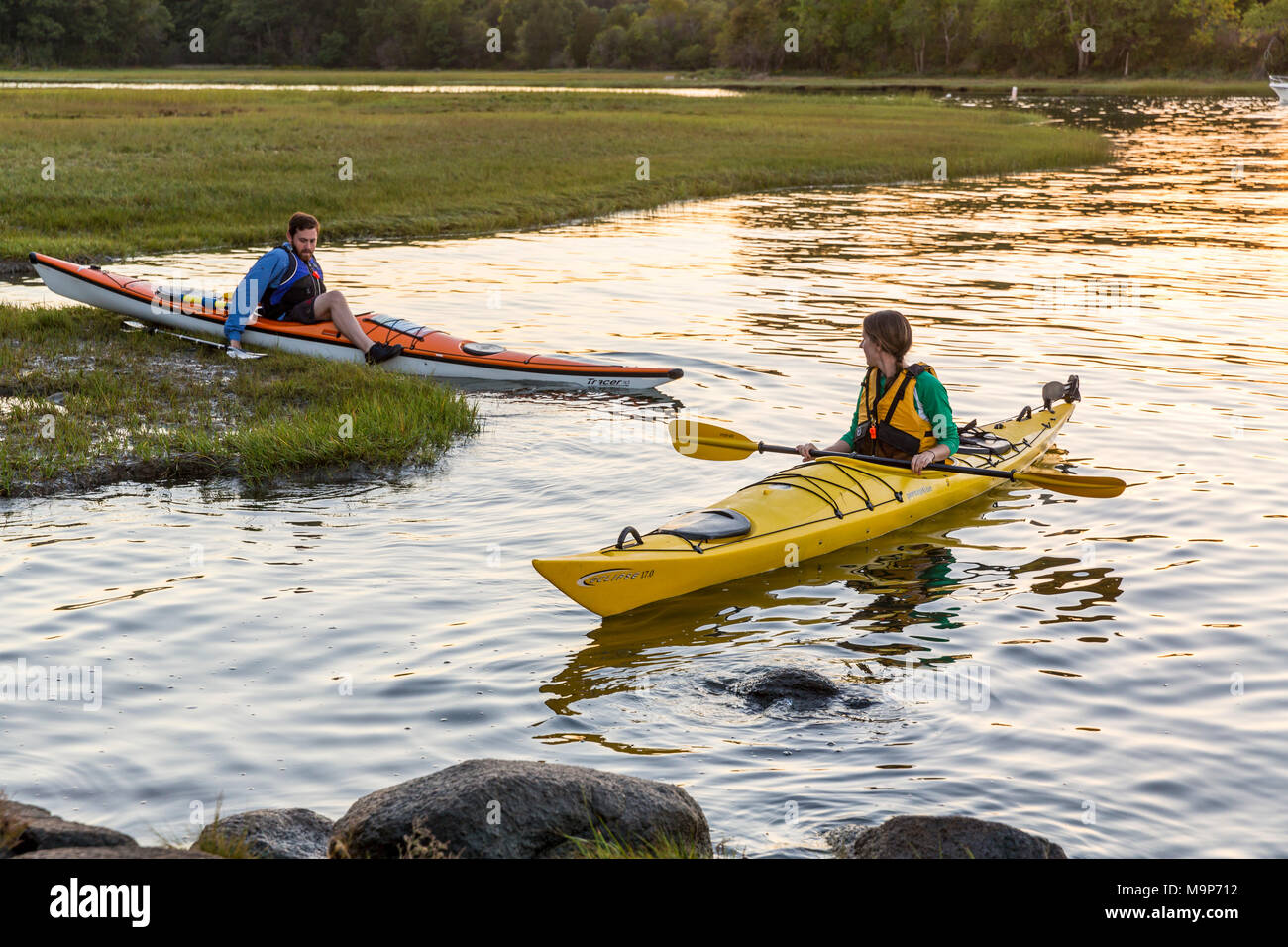 Kayakers on Essex River at Cox Reservation in Essex, Massachusetts Stock Photo