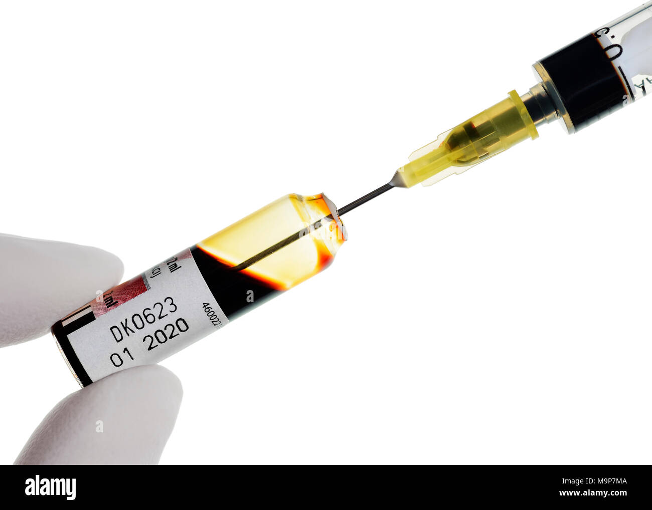 Vial and Syringe, Preparing for an Injection of Iron, used in the treatment of Anemia, Close Up Stock Photo