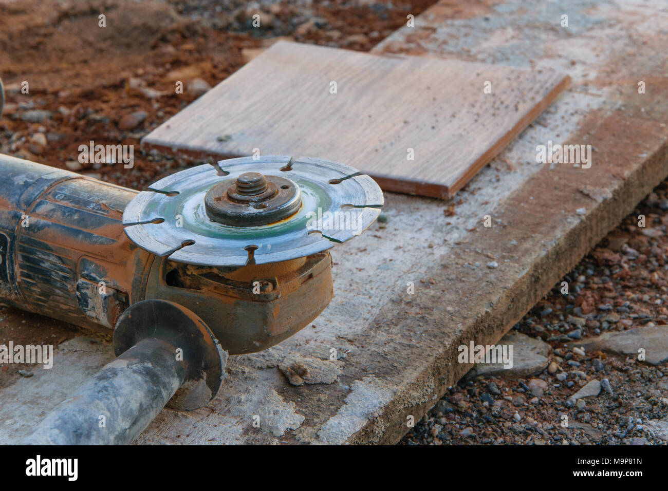 Professional tool to cut the tiles, construction industry concept Stock