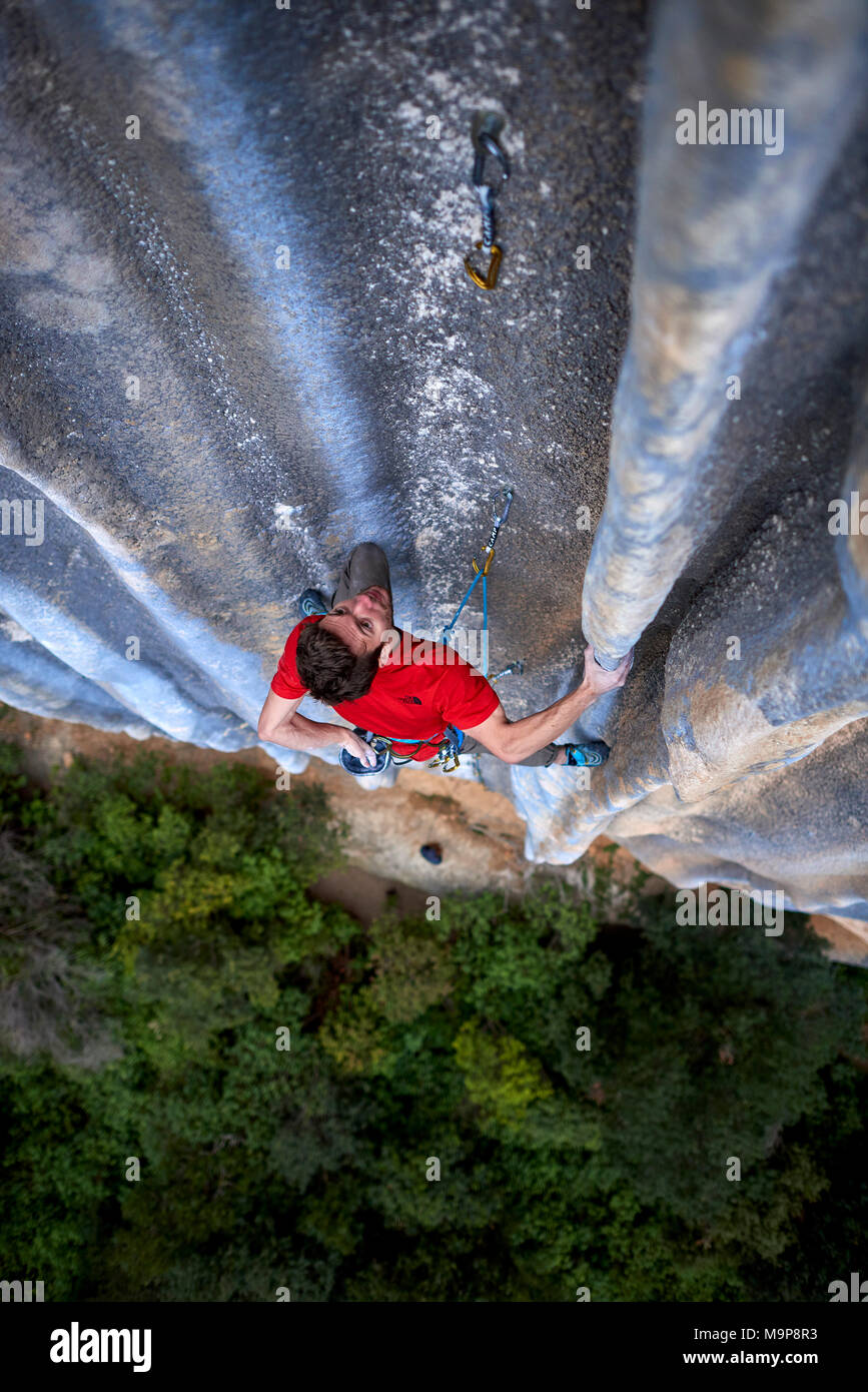Italian professional climber Stefano Ghisolfi on a week long trip to Spain while shooting stills and videos for his new sponsor The North Face. During the trip he climbed La Rambla, 9a+ in Siurana in just 4 attempts and 2 days. Photos on La Rambla are lit with a strobe hand held by Jacopo Larcher on the first day and Lena Drapella on the second. On the second half of the trip we shot action and lifestyle around Stefanos ascent of First Round First minute, 9b in Margalef. We also shot some images on Meconi, 8a. Stock Photo