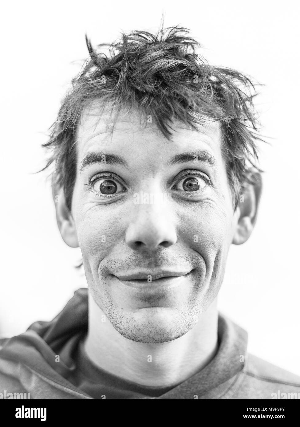 Studio portrait of Alex Honnold with messy hair, South Tyrol, Italy Stock Photo