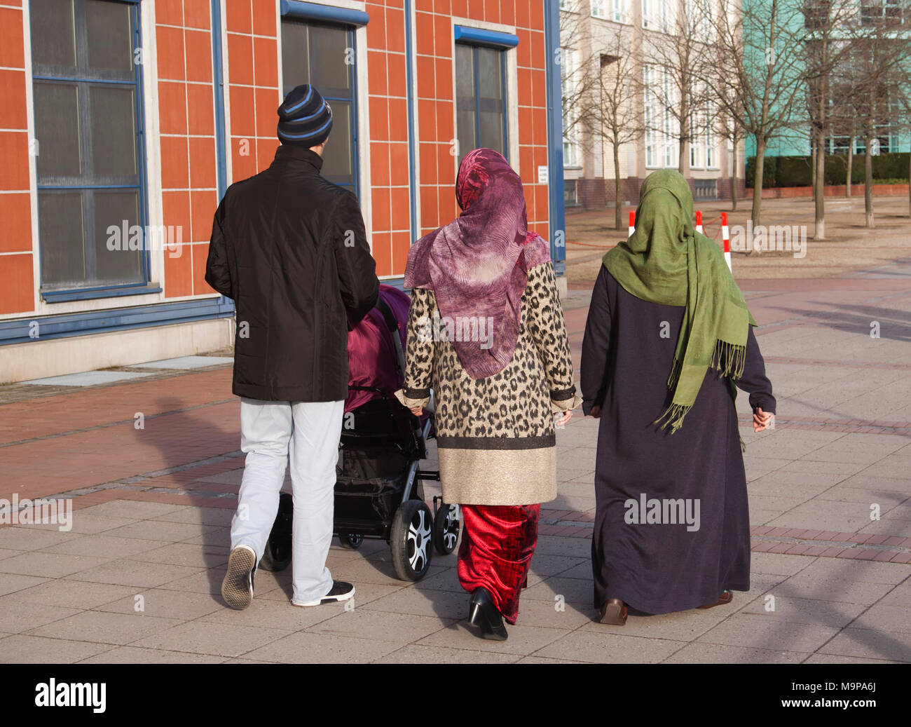Muslim family with pram Stock Photo