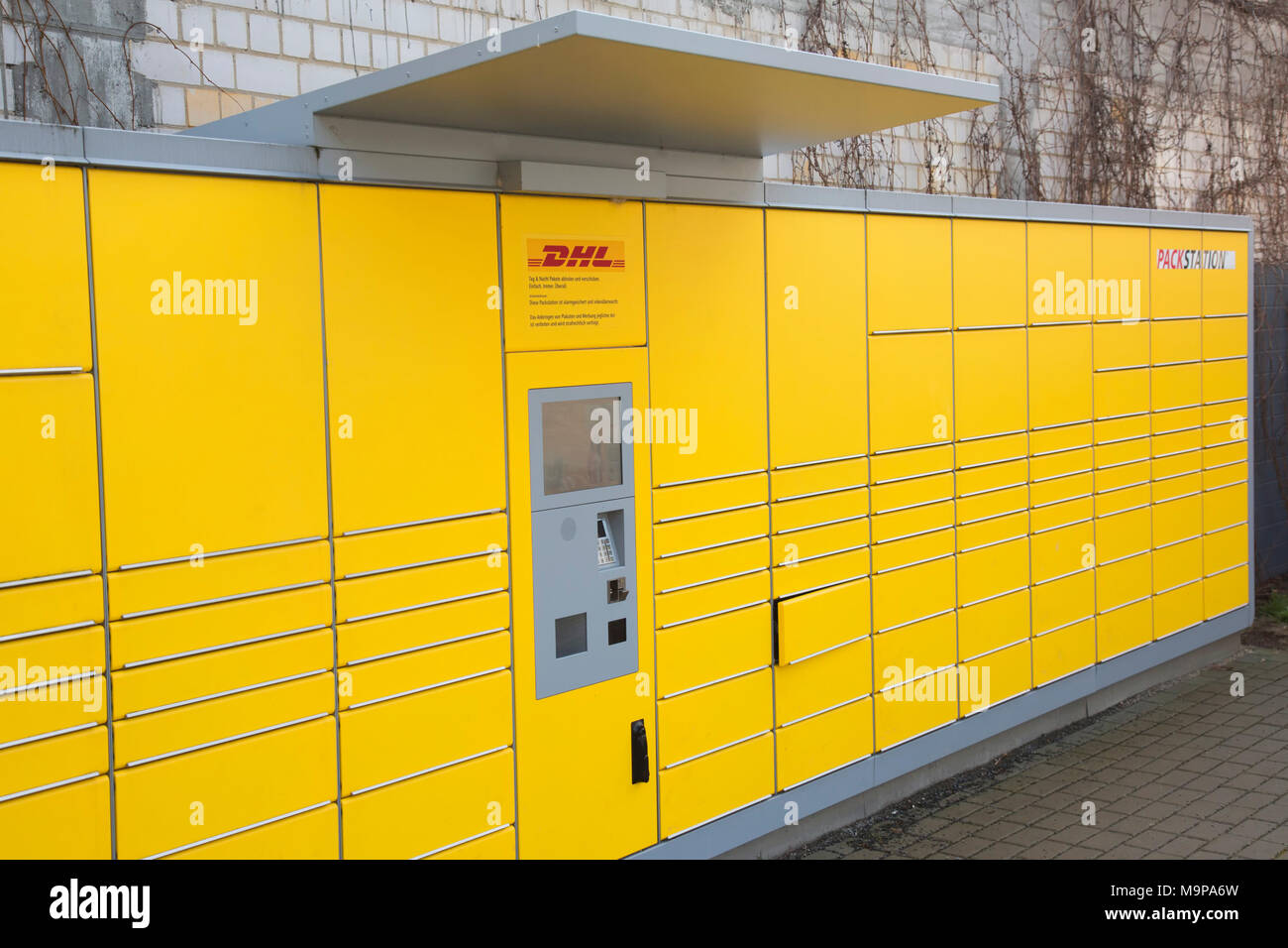 Packstation of DHL, Huttenstr., Berlin, Germany Stock Photo