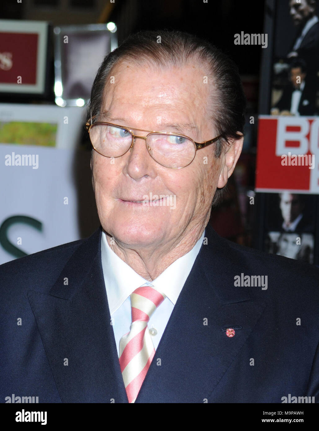 NEW YORK, NY - NOVEMBER 09:  Sir Roger Moore meets fans and signs copies of his book 'Bond on Bond' on November 9, 2012 in New York City.   People:  Sir Roger Moore Stock Photo