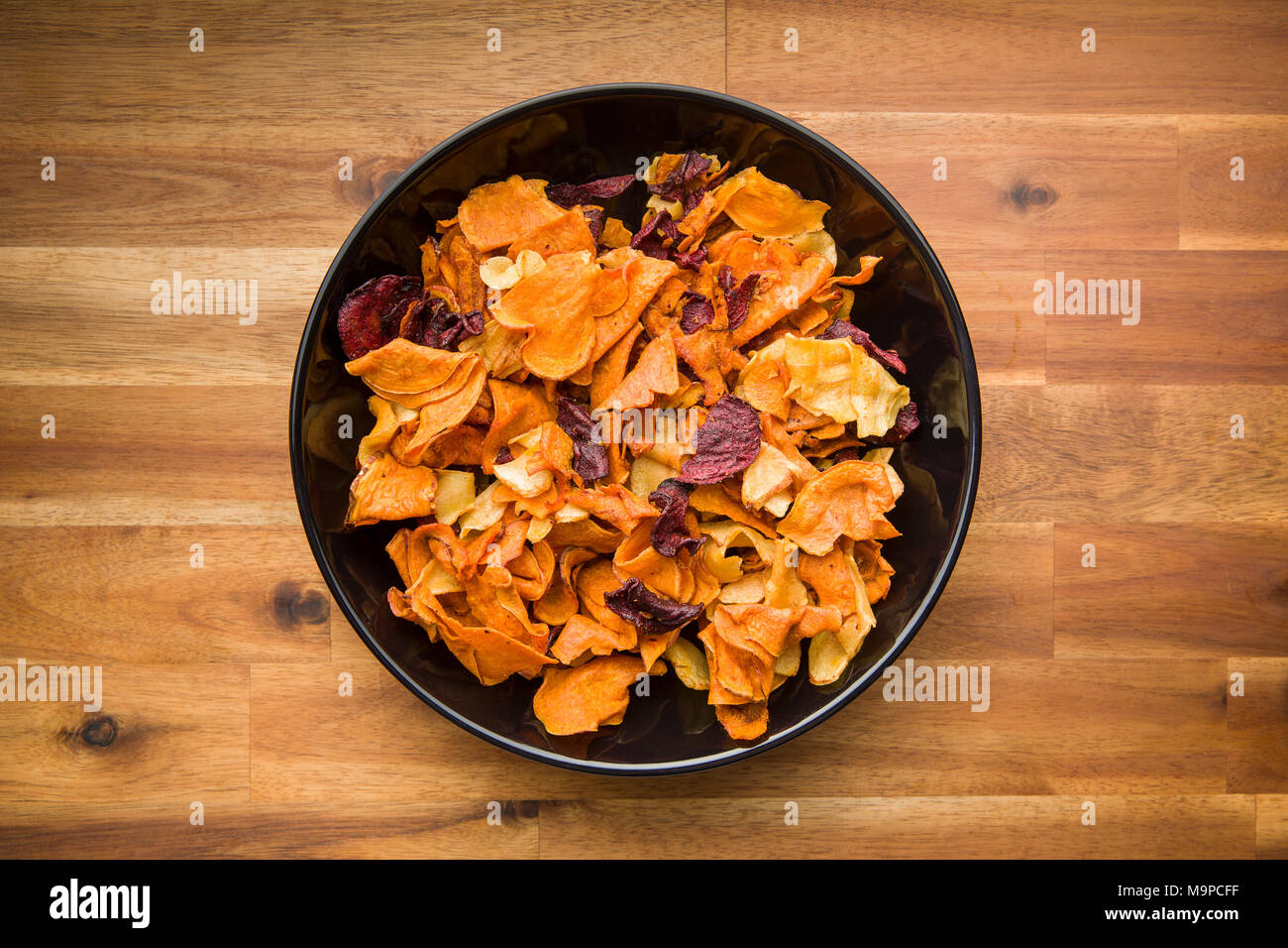 Mixed fried vegetable chips in bowl Stock Photo Alamy
