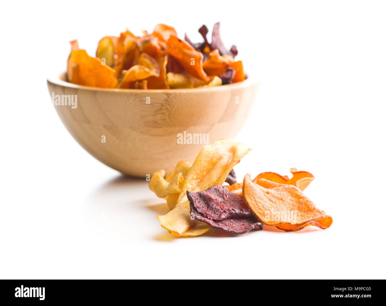 Mixed fried vegetable chips isolated on white background Stock Photo