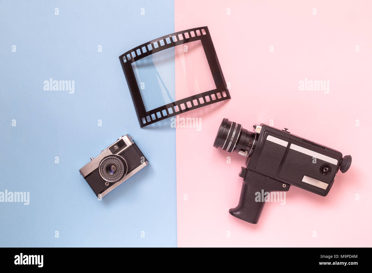 Retro vintage analog film camcorder, photo camera and picture frame on