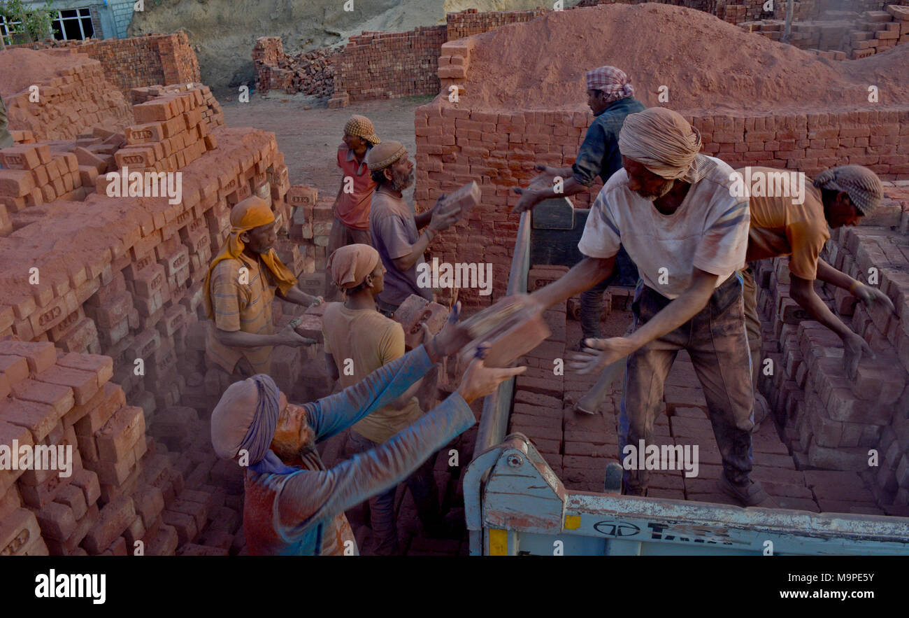 NonKashmiri laborers working inside a brick kiln in a village of