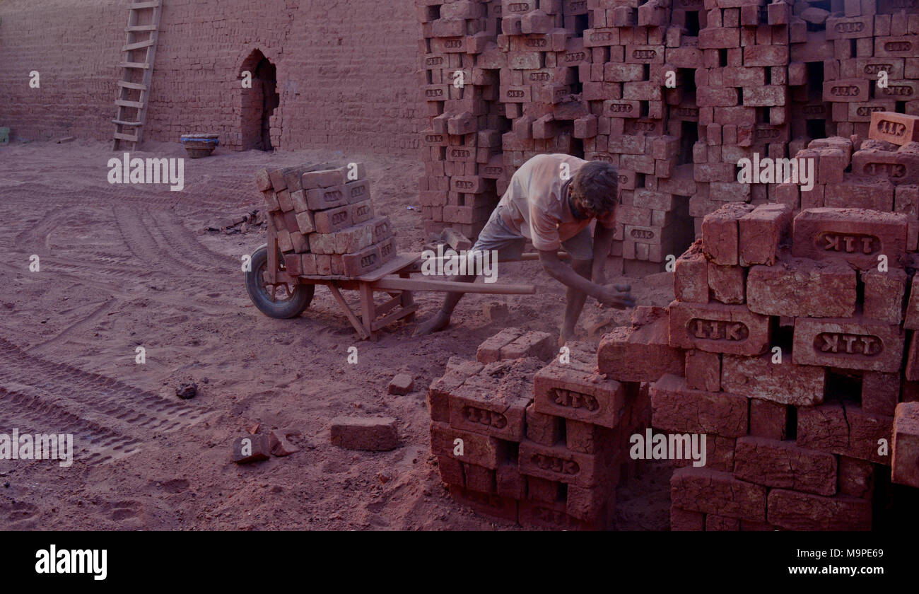 NonKashmiri laborers working inside a brick kiln in a village of