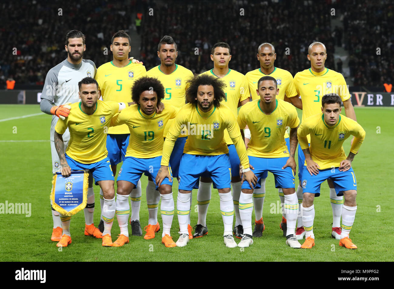 Berlin, Germany. 27th Mar, 2018. 27 March 2018, Germany, Berlin, Olympia Stadium: Soccer, Friendly International match, Germany vs Brazil: Brazil's national team posing for a team photo before the match. Front L-R: Dani Alves, Willian, Marcelo, Gabriel Jesus, Philippe Coutinho. Back L-R: goalkeeper Alisson, Casemiro, Thiago Silva, Fernandinho, Miranda. Credit: Jan Woitas/dpa/Alamy Live News Stock Photo