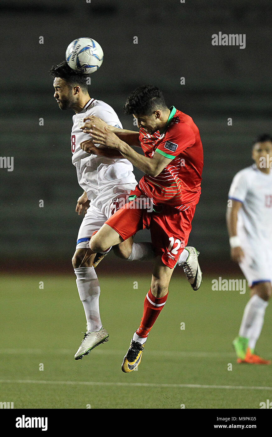 Manila, Philippines. 27th Mar, 2018. Manuel Ott (L) of the Philippines competes against Dzalilov Romish of Tajikistan during their 2019 AFC Asian Cup Qualification Final Round in Manila, the Philippines, March 27, 2018. The Philippines won 2-1. Credit: Rouelle Umali/Xinhua/Alamy Live News Stock Photo