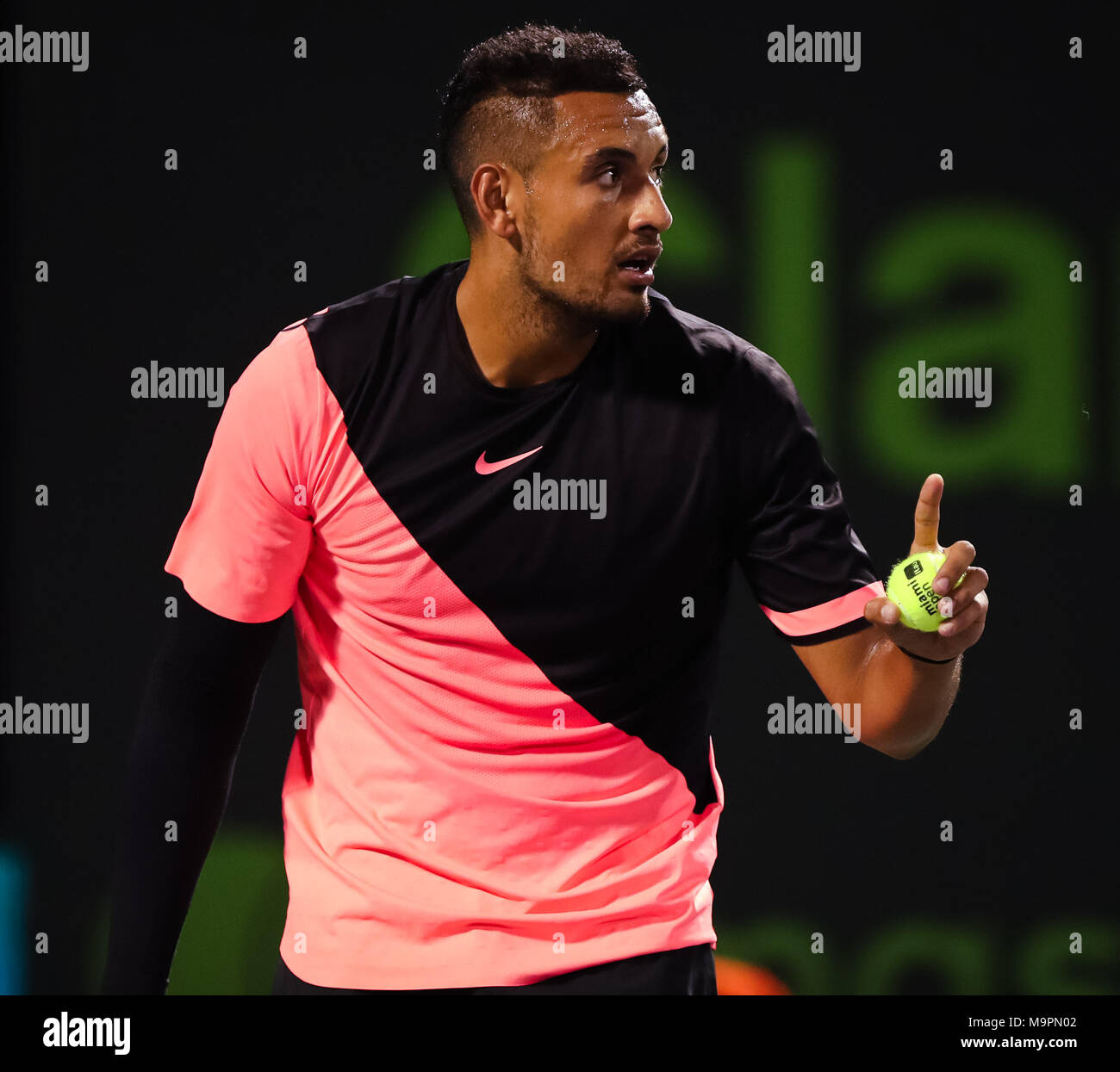 Key Biscayne, Florida, USA. 27th Mar, 2018. Nick Kyrgios of Australia  clarifies a first-serve with the chair the umpire during his match against  Alexander Zverev of Germany during a quarterfinal on Day
