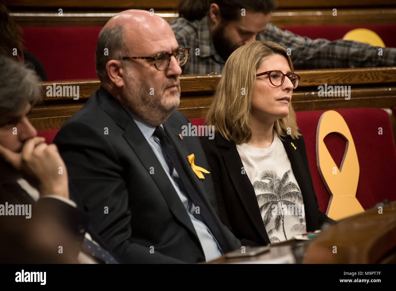 Barcelona, Catalonia, Spain. 28th Mar, 2018. Junts per Catalunya (JxCAT) member of parliament Eduard Pujol (L) and Elsa Artadi during a parliament session. The independentist parties of the Catalan parliament vindicate the right of Carles Puigdemont to be invested as Catalonia president. Carles Puigdemont is being held by the German authorities after been arrested on an international warrant. Credit: Jordi Boixareu/ZUMA Wire/Alamy Live News Stock Photo